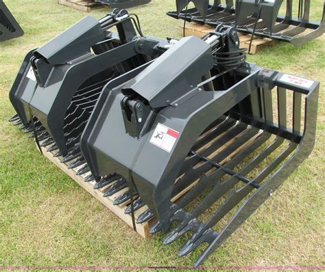 used rock grapple bucket for skid steer|rock grapple bucket for tractor.